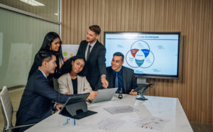 The multicultural business team engages in collaborative brainstorming sessions to develop cutting-edge strategies and new business model for achieving our sales key performance indicators (KPIs).